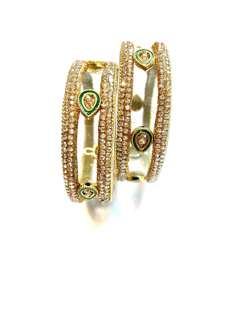 Elegant Gold-Plated Designer Bangles with Pear-Shaped Motifs